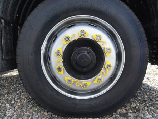 Linked Wheel Nut Indicators on Truck